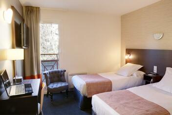 Le Logis Havvah Hôtel Gap dispose de chambres avec lits séparés idéales pour les déplacements professionnels